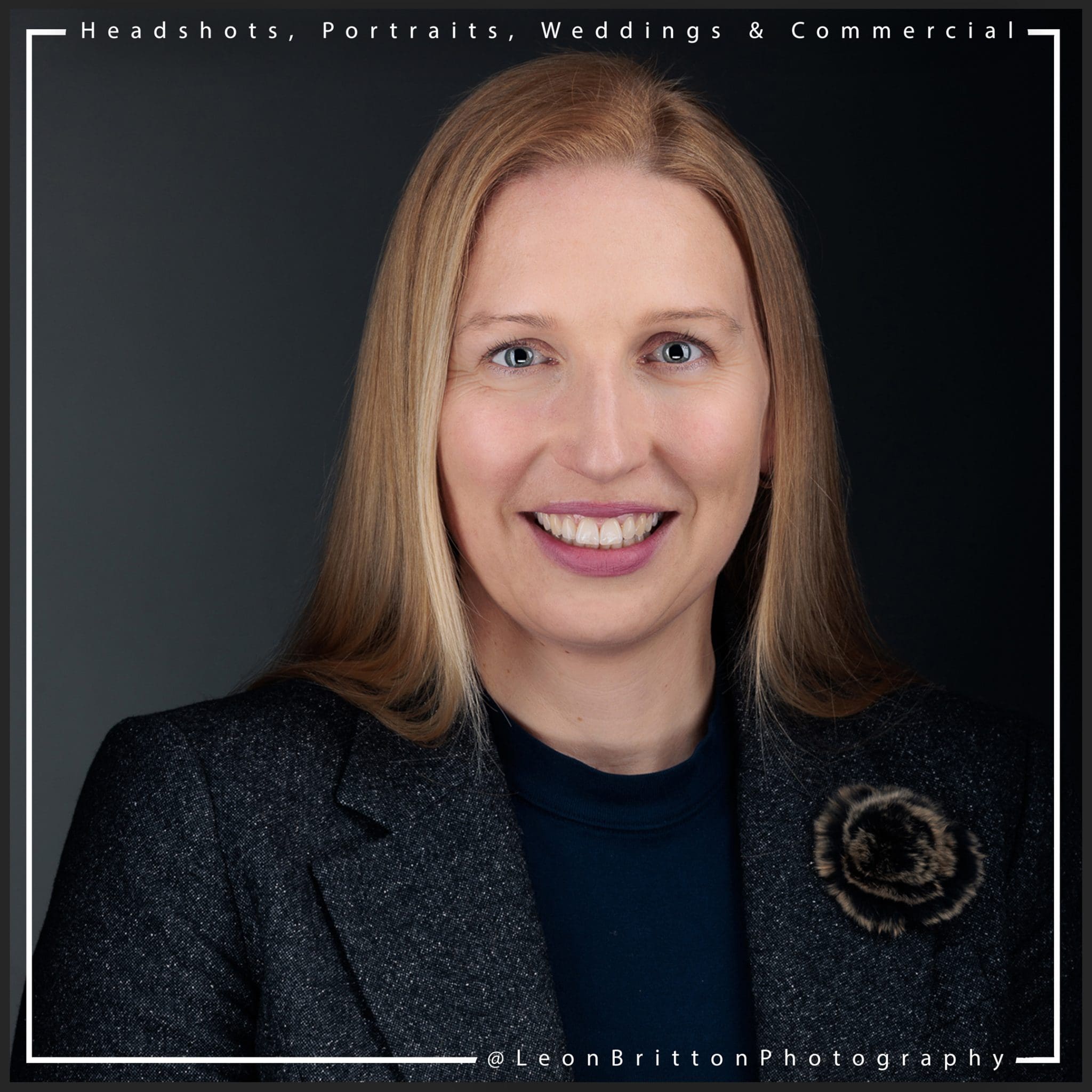 Creative professional headshot in office