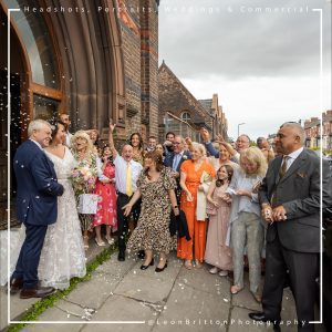 Professional wedding photographer in action in Liverpool