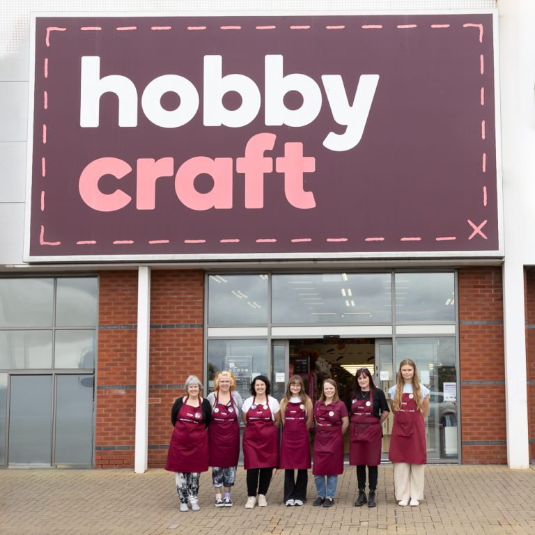 Hobbycraft store opening team photo outside the storefront
